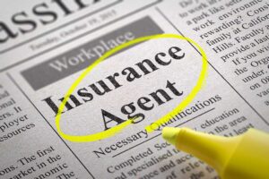 Driver reviews a rental agreement and insurance documents beside car keys and a parked vehicle.